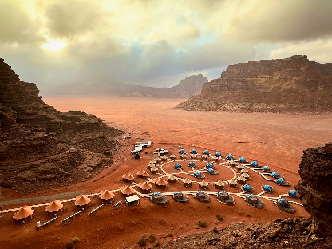 A Bedouin-run camp in Wadi Rum, where canvas tents and firelight sit beneath dunes crossed by camel caravans for centuries.
