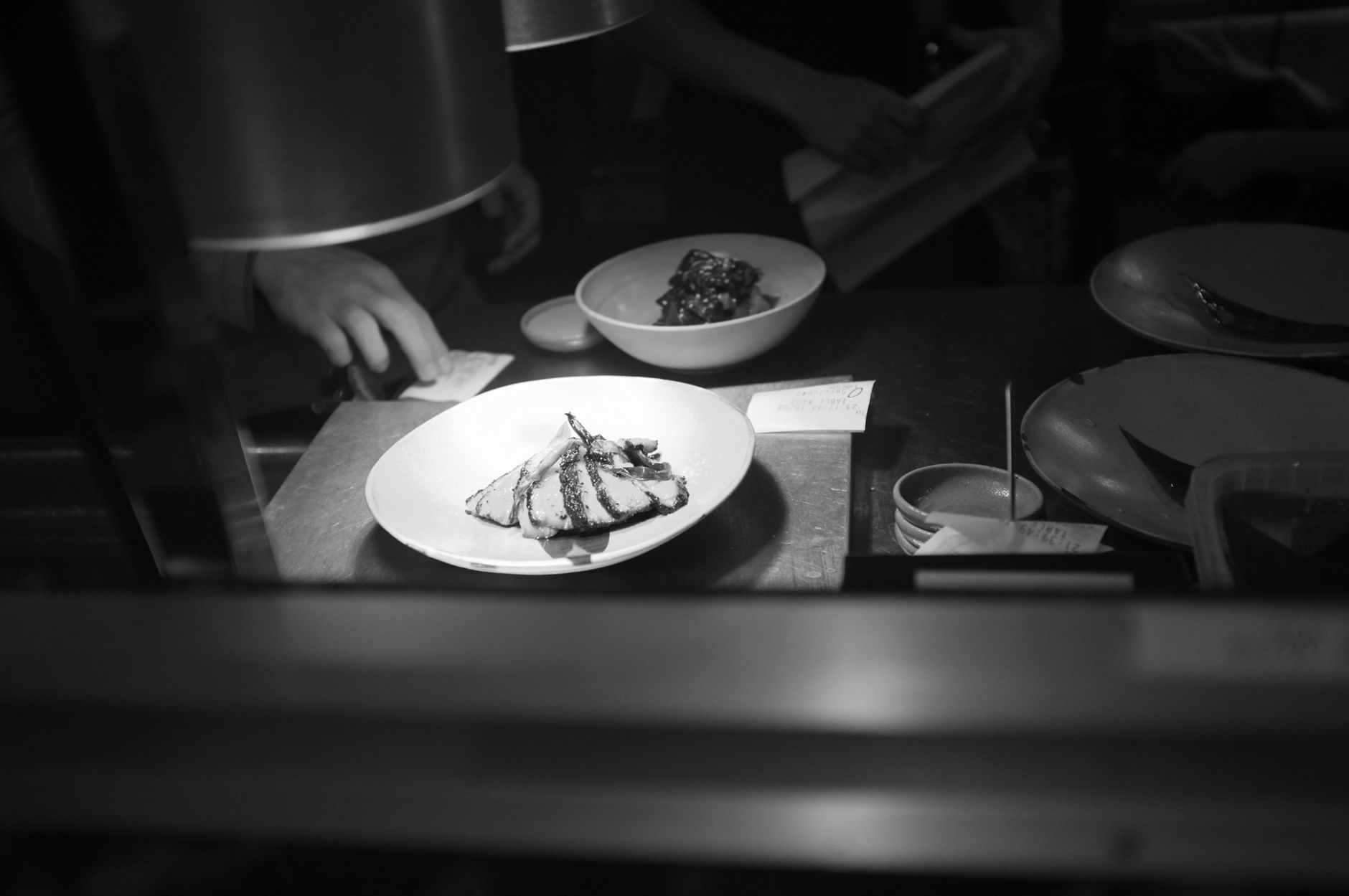 A boreal-inspired plate at Chez Boulay, mixing spruce and sea buckthorn with local fish.