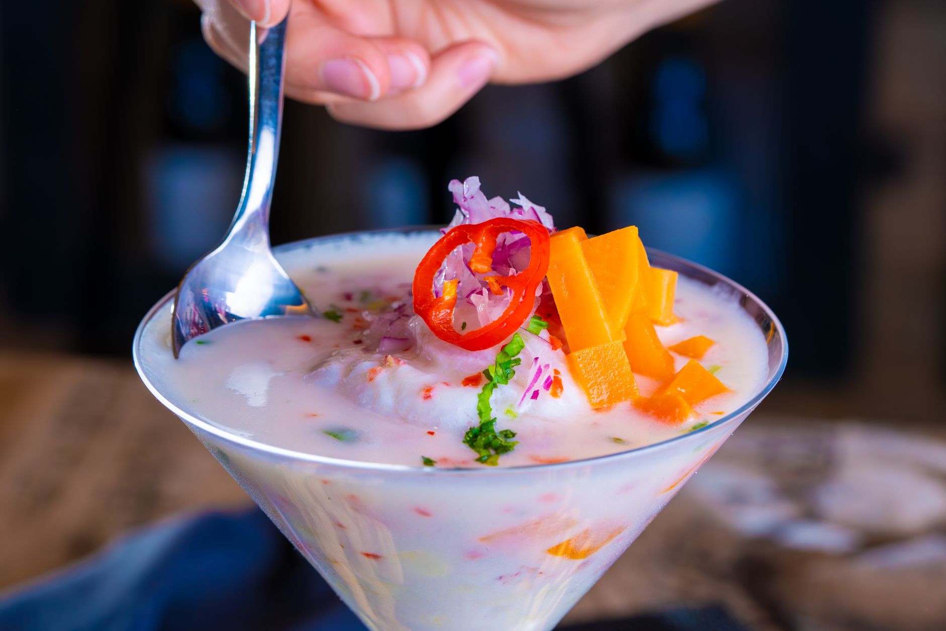 A plate of kokoda, raw reef fish cured in lime with coconut cream, served village-style.