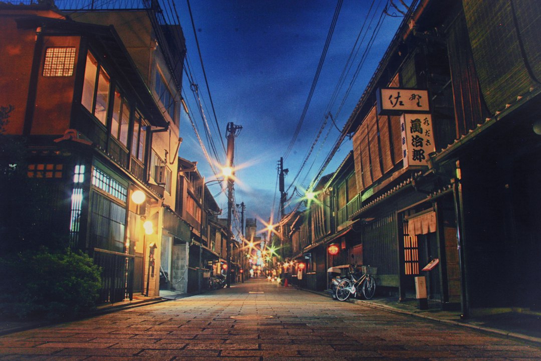 A quiet street in Gion after the day-trippers had gone, lanterns lit outside a handful of teahouses.