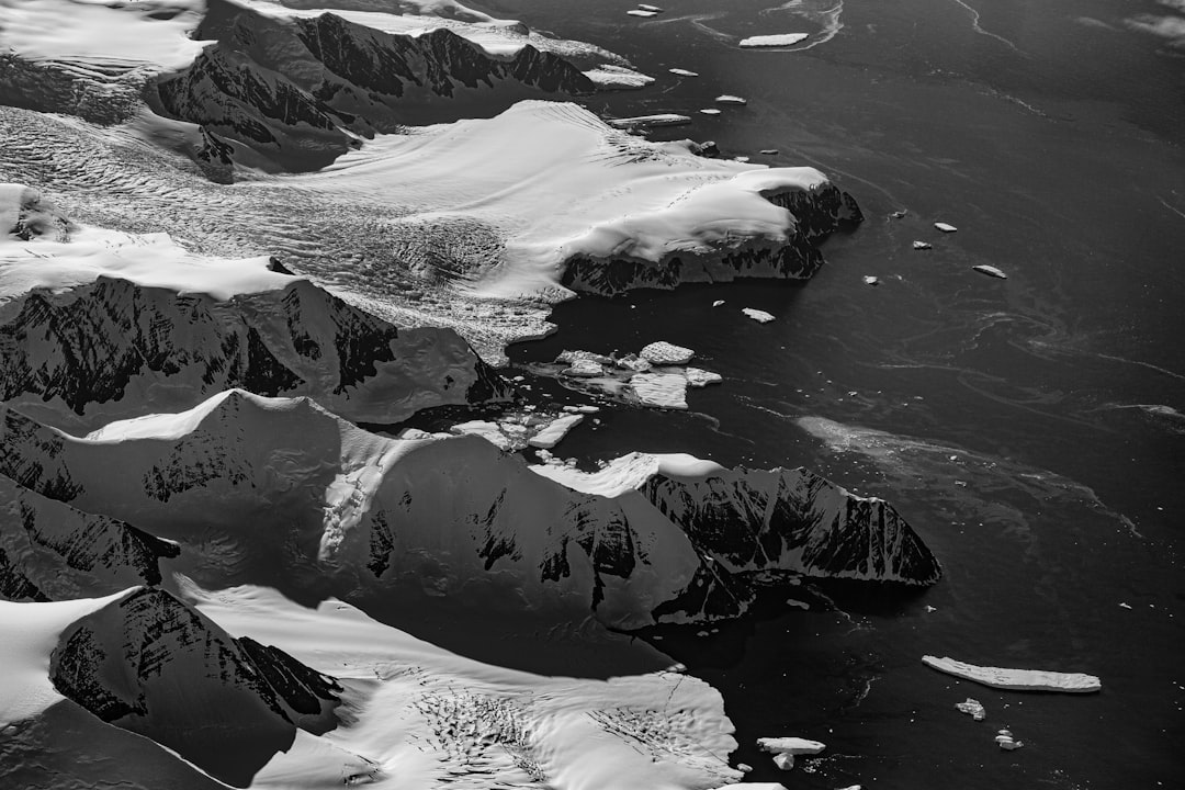 A Zodiac approach in choppy water near the South Shetland Islands, the same conditions that make Point Wild landings weather-dependent.