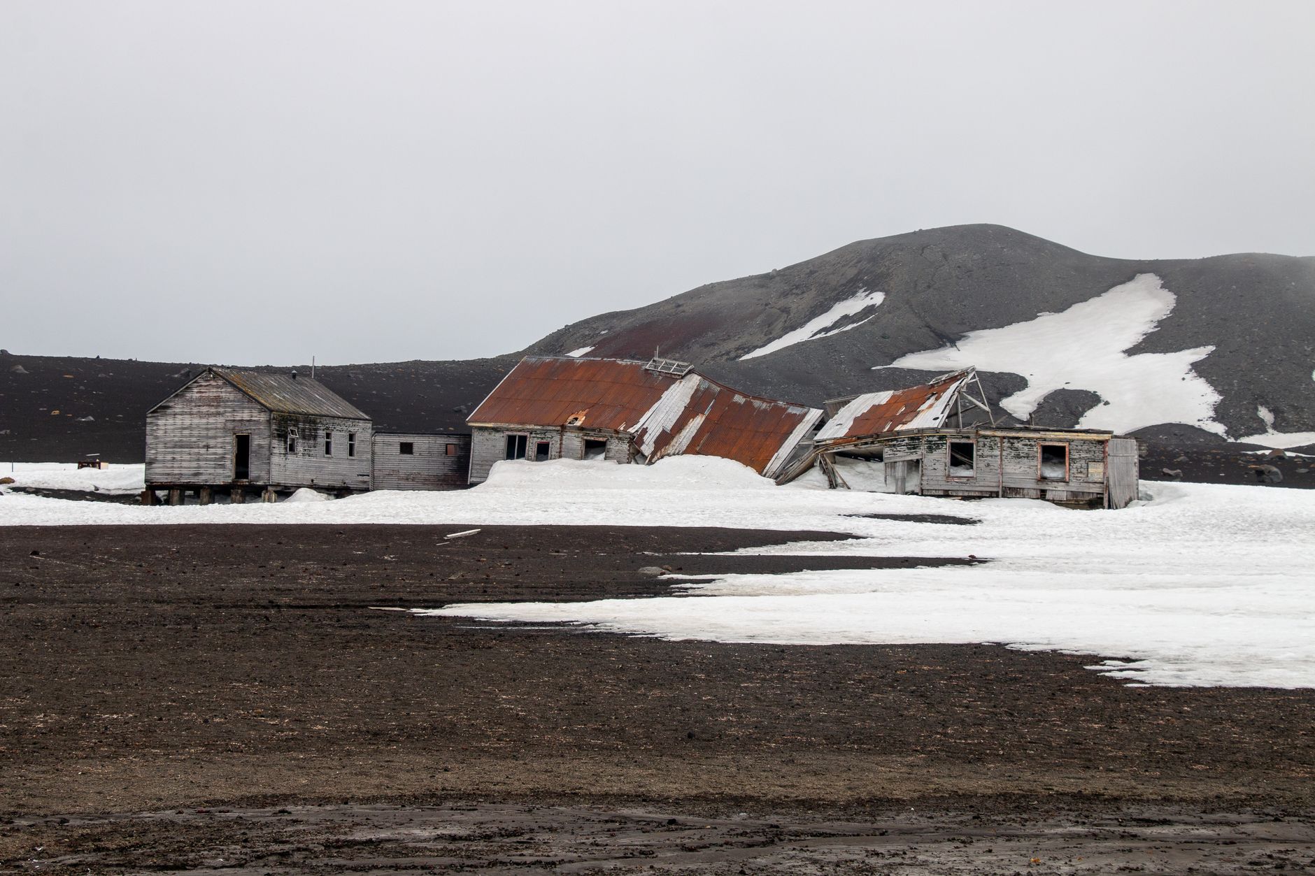 Aerial view of Deception Island's horseshoe-shaped caldera in the South Shetland Islands