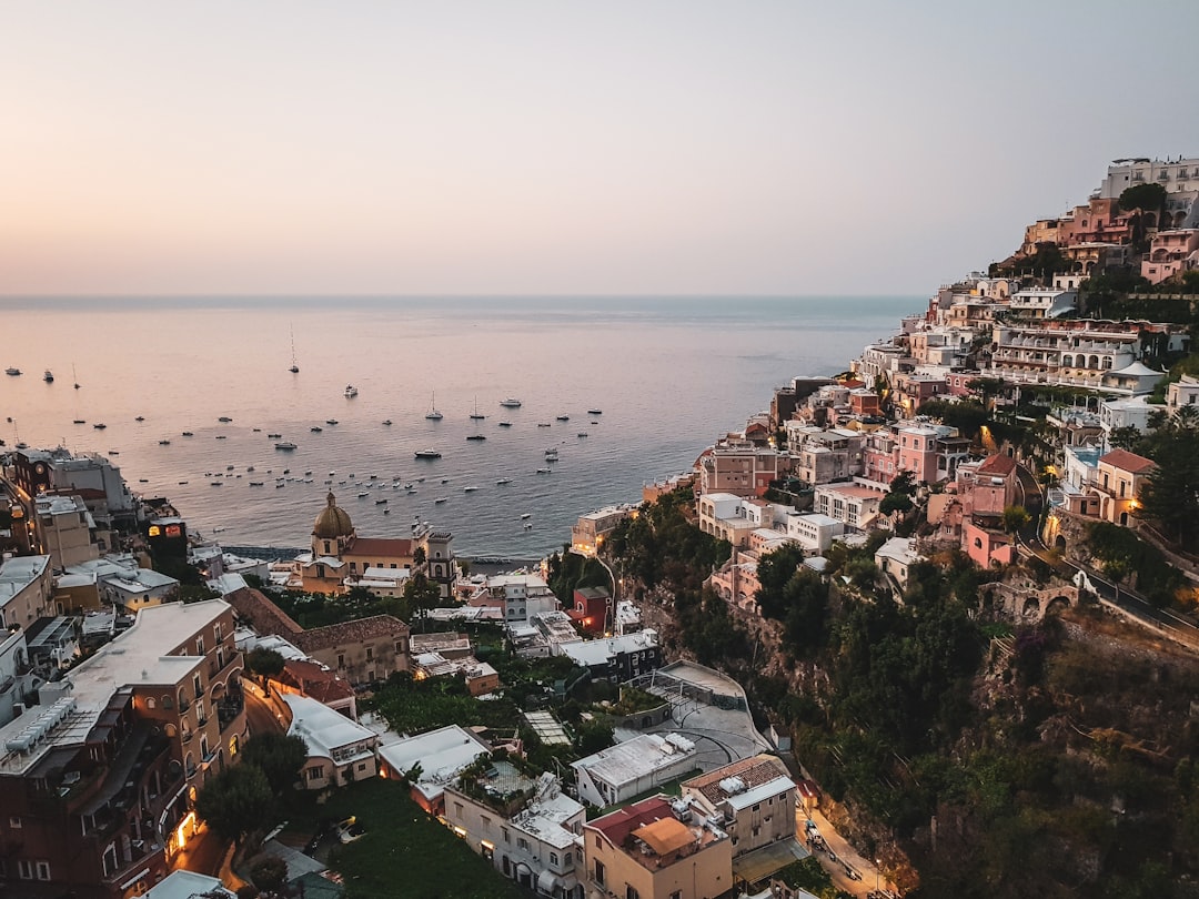Amalfi Coast seaside village with colorful buildings on dramatic cliffs