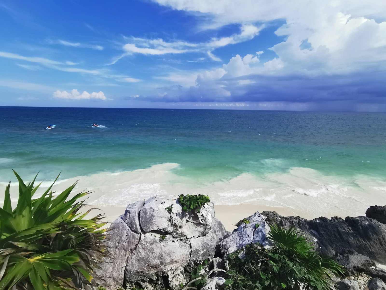 Beach wedding ceremony in Tulum with turquoise water and white sand