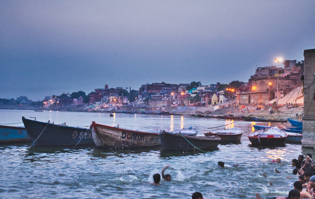 Boats and riverbank at sunrise on the Ganges River near Varanasi