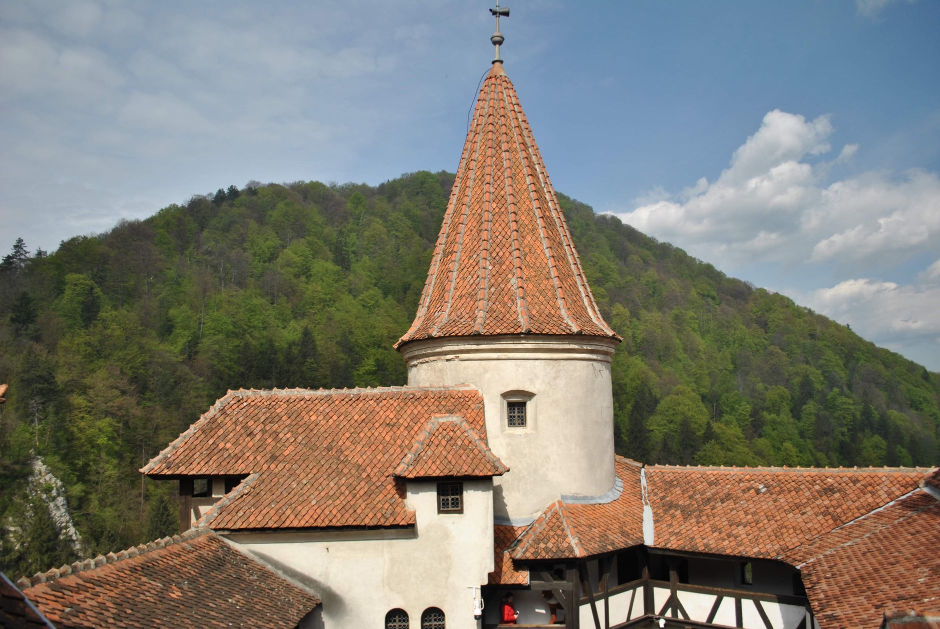 Bran Castle in Transylvania surrounded by forested hills