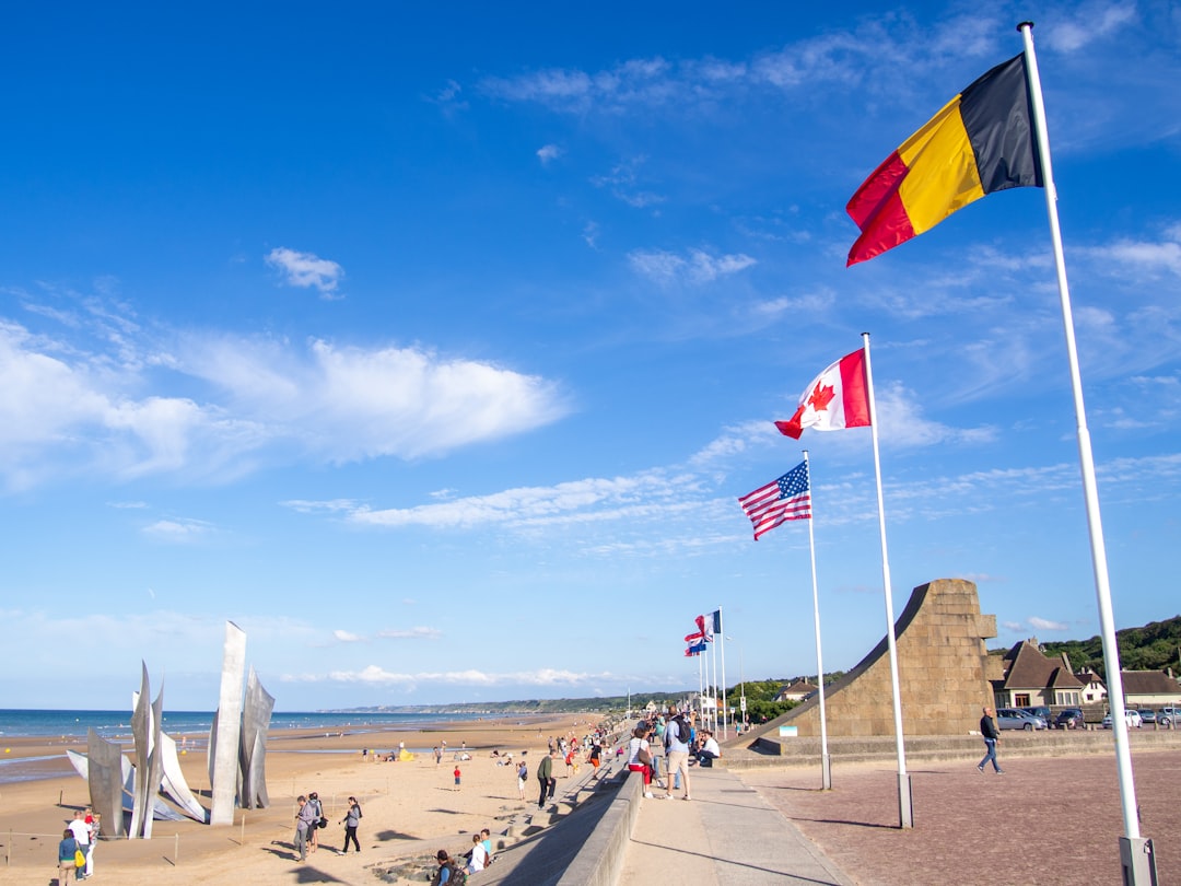 Concrete remnants of German strongpoint WN62 still stand above the sand at Omaha Beach.