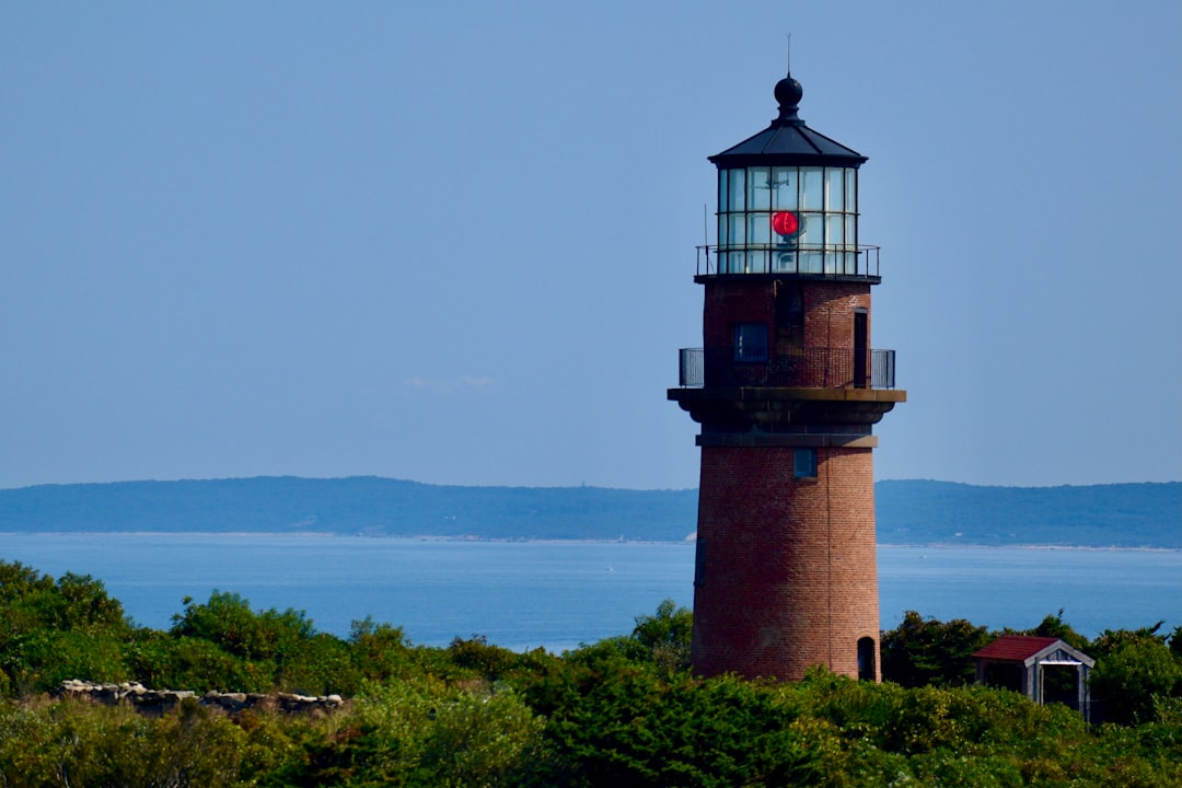 Currituck Beach Lighthouse in Corolla, unpainted red brick since 1875, open for climbs most of the year.
