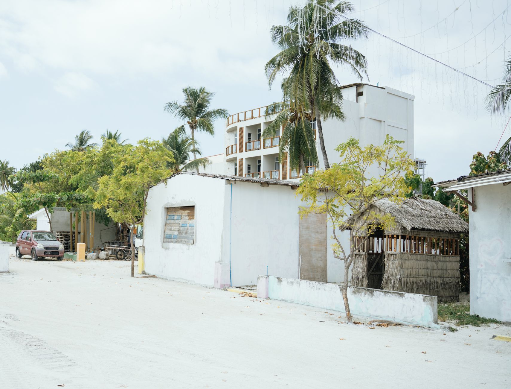 Daily life on Maafushi, a local island popular for cultural day trips and budget guesthouses.