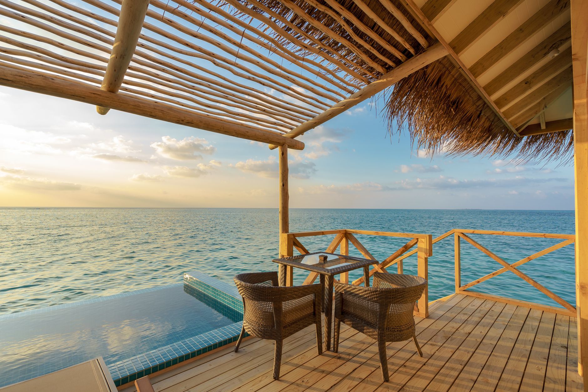 Evening light over the lagoon villas at Kunfunadhoo Island.