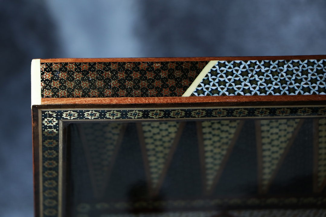 Finished marquetry boxes inlaid with lemon wood and mother of pearl, sold directly from the cooperative workshops.