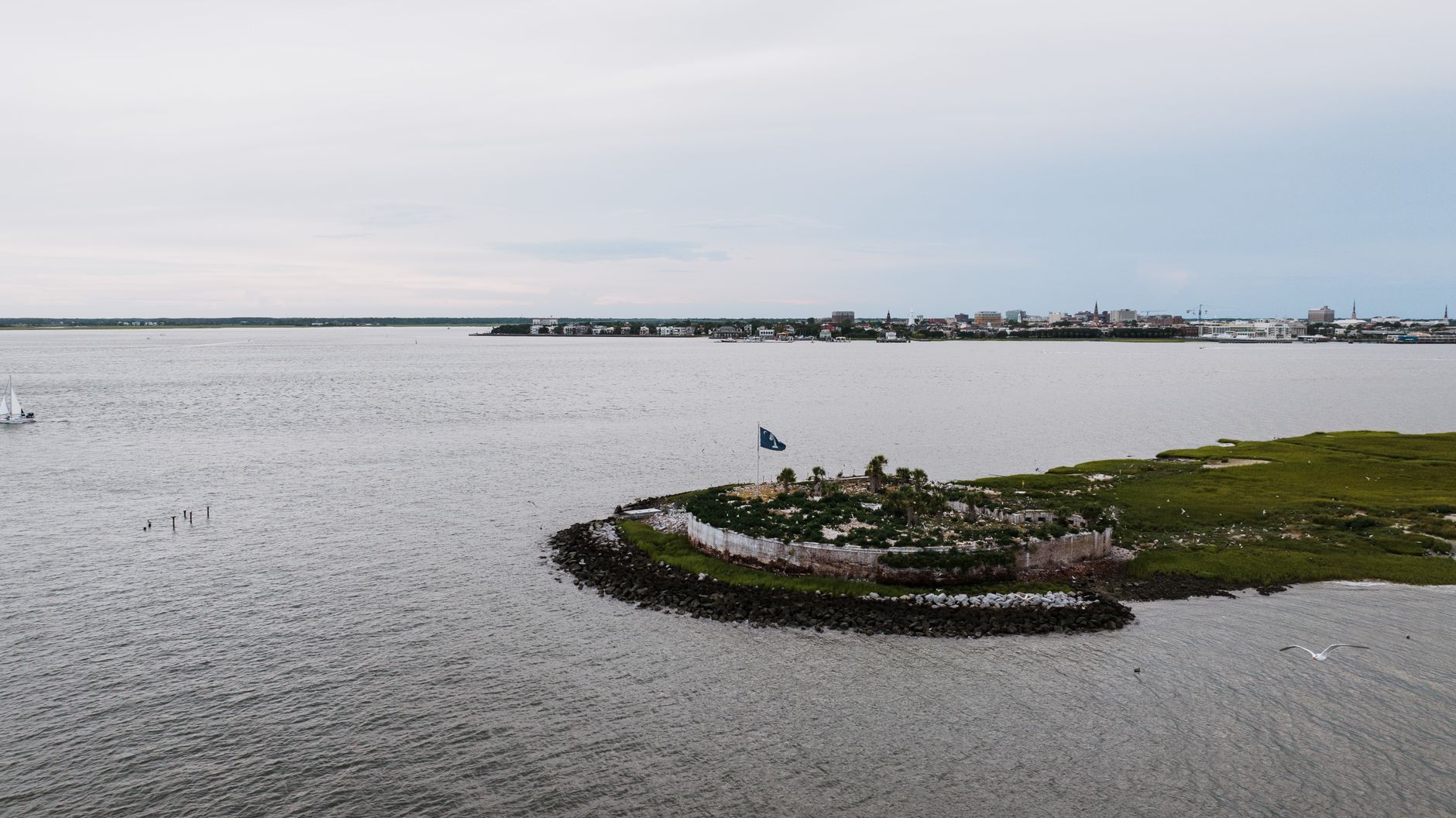 Fort Sumter sits on a man-made island in Charleston Harbor, reachable by a 30-minute ferry from Liberty Square.