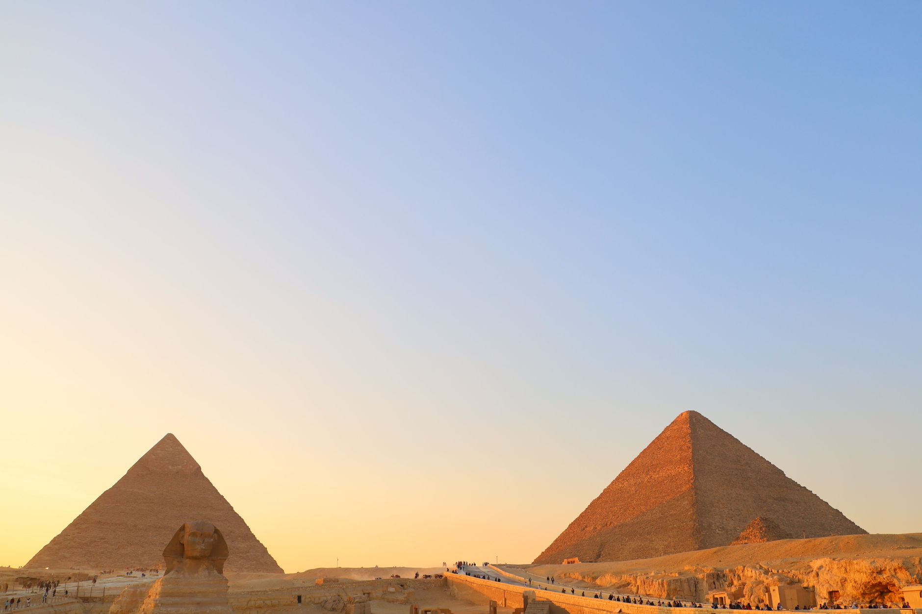 Great Pyramid of Giza and the Great Sphinx bathed in early morning light