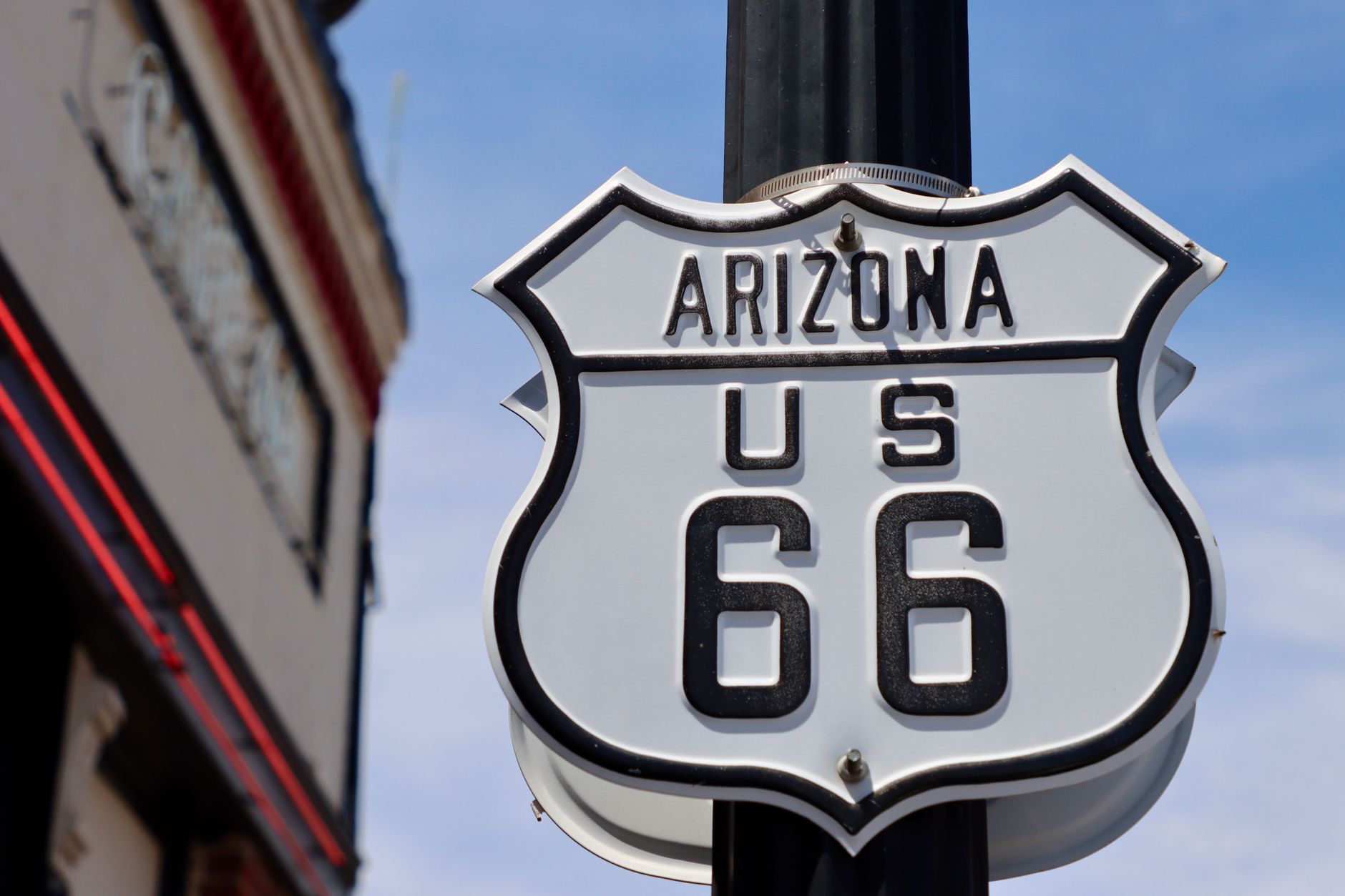 Historic interpretive marker on Tucumcari's Neon Mile with vintage motor court photograph and text information