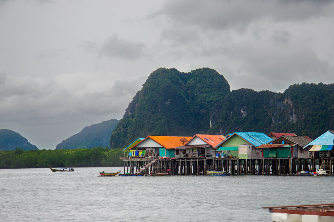 Ko Panyee's stilt village, built out over the water on wooden pilings, is a common lunch stop on Phang Nga Bay tours.