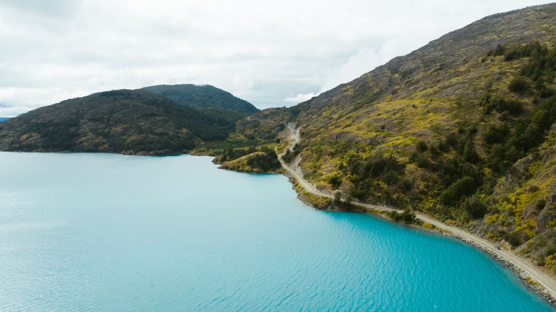 Lago Nordenskjöld's glacial-blue water runs alongside the trail between Los Cuernos and Chileno.