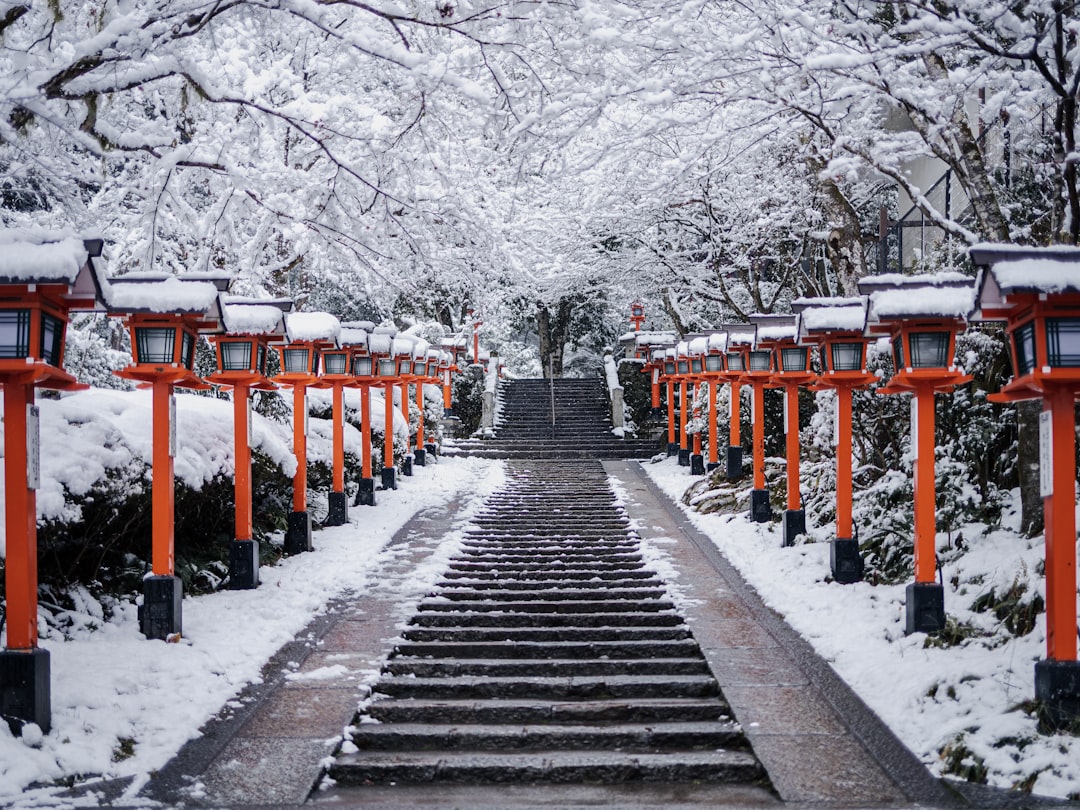 Lanterns illuminate narrow streets in Gion, Kyoto's geisha quarter, after an evening snow.