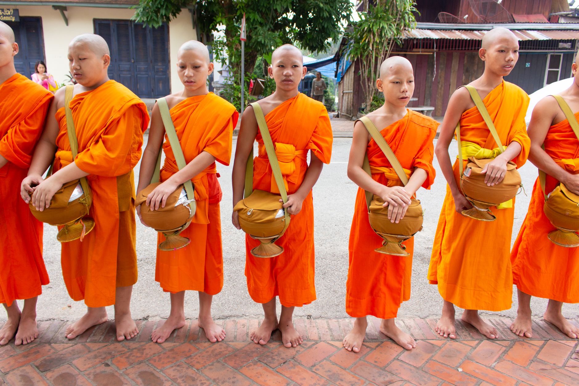 Dawn Alms-Giving Along the Mekong