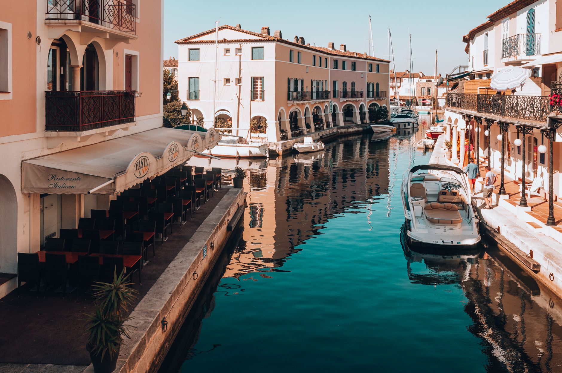 Mahón's harbor waterfront comes alive in spring with outdoor dining and harbor-side walks, drawing diners at cooler evening hours.