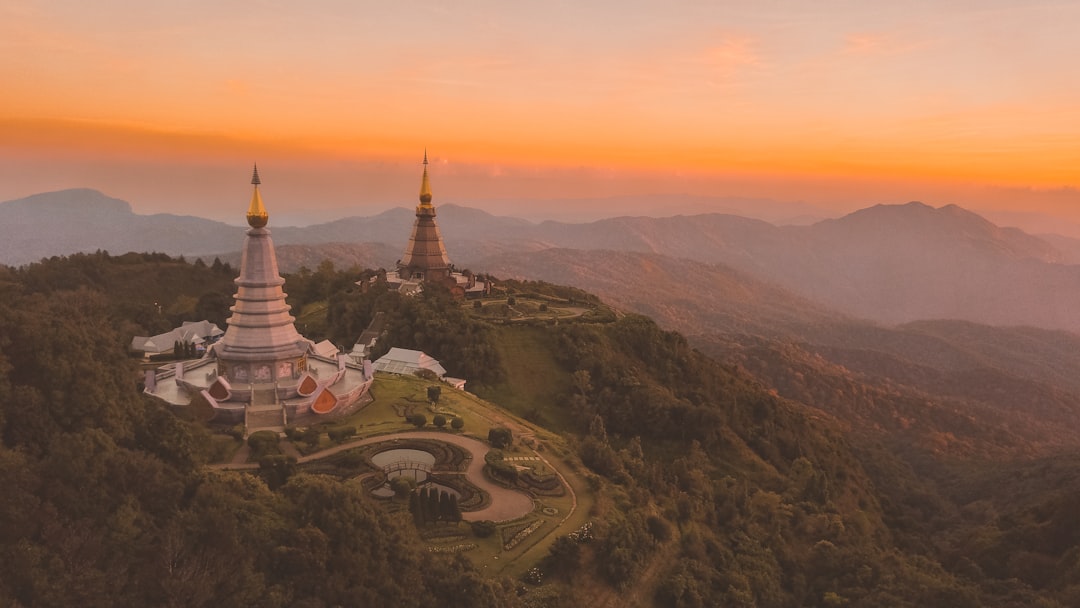Mist rolls through the pine forest near Doi Inthanon's twin royal pagodas, a common day-trip stop southwest of the city.