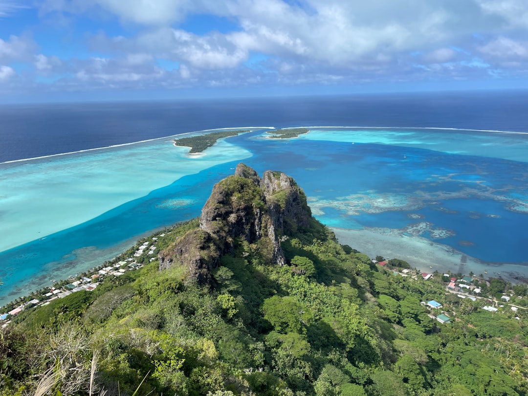 Mount Otemanu's basalt spire rises over 700 meters and anchors nearly every lagoon view.