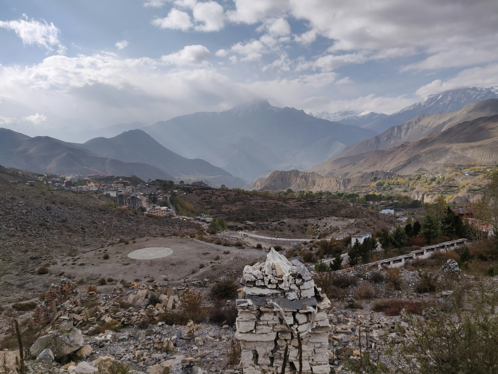 Muktinath's temple complex, with the dry Mustang hills rising behind it.