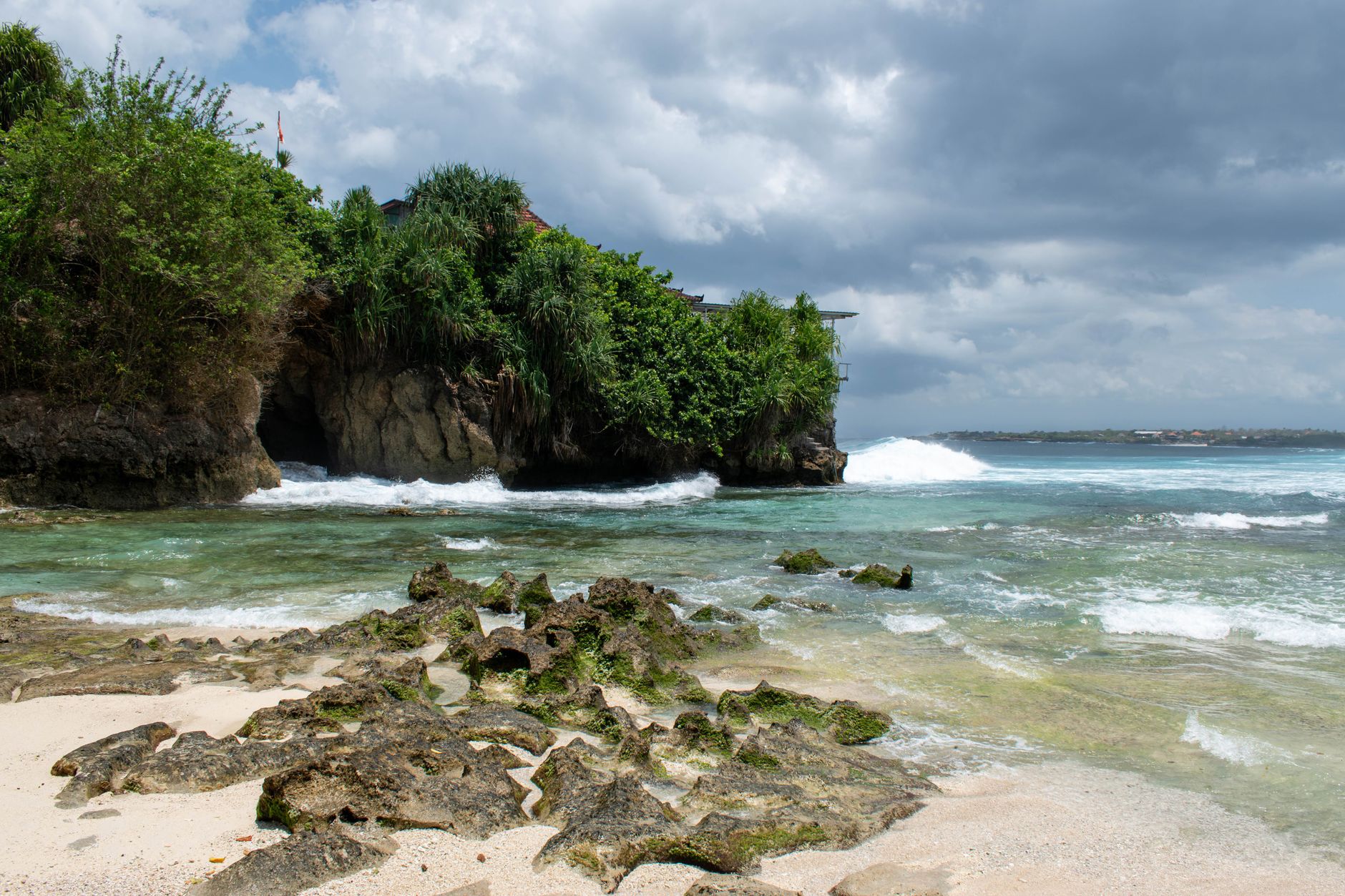 Padang Padang Beach, reached down a narrow limestone stairway, a popular pre-wedding photography spot.