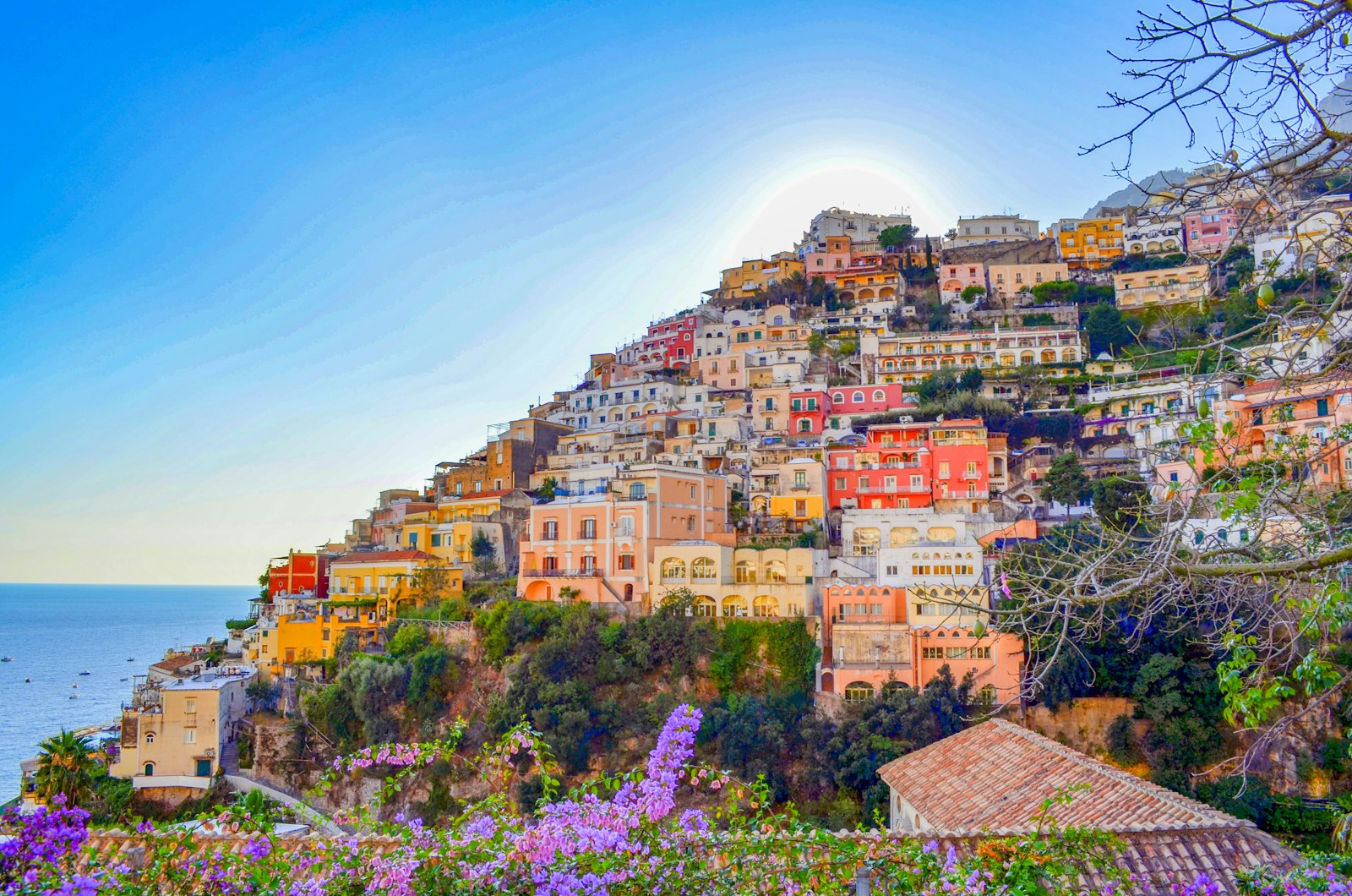 Pastel-colored cliffside buildings of Positano overlooking the sea