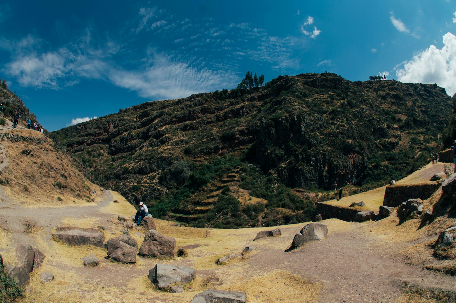 Pisac's agricultural terraces climb the mountainside above the Sunday market.