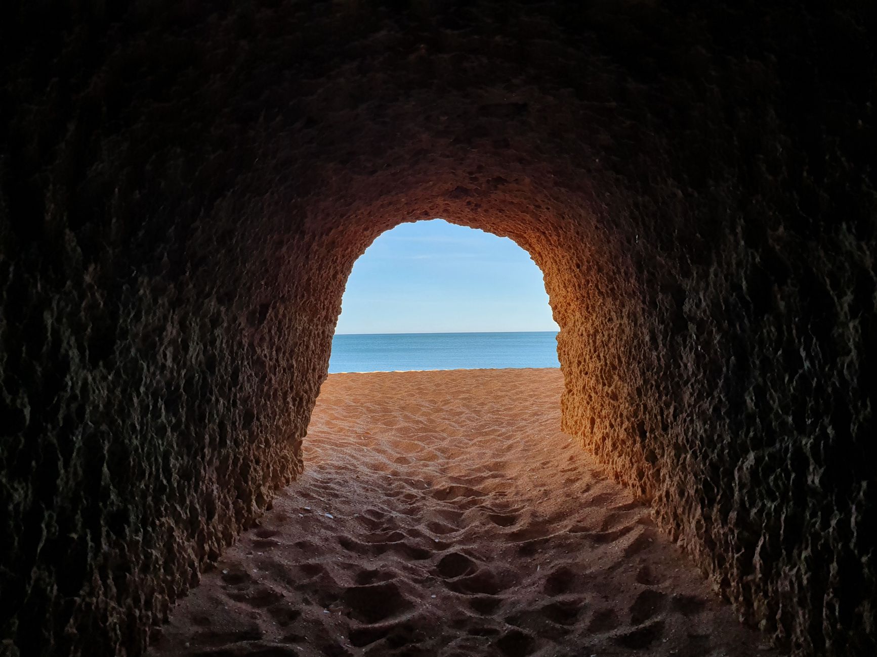 Playa del Amor on the Islas Marietas is reached by boat and a short swim through a rock tunnel into an open-air sinkhole beach.