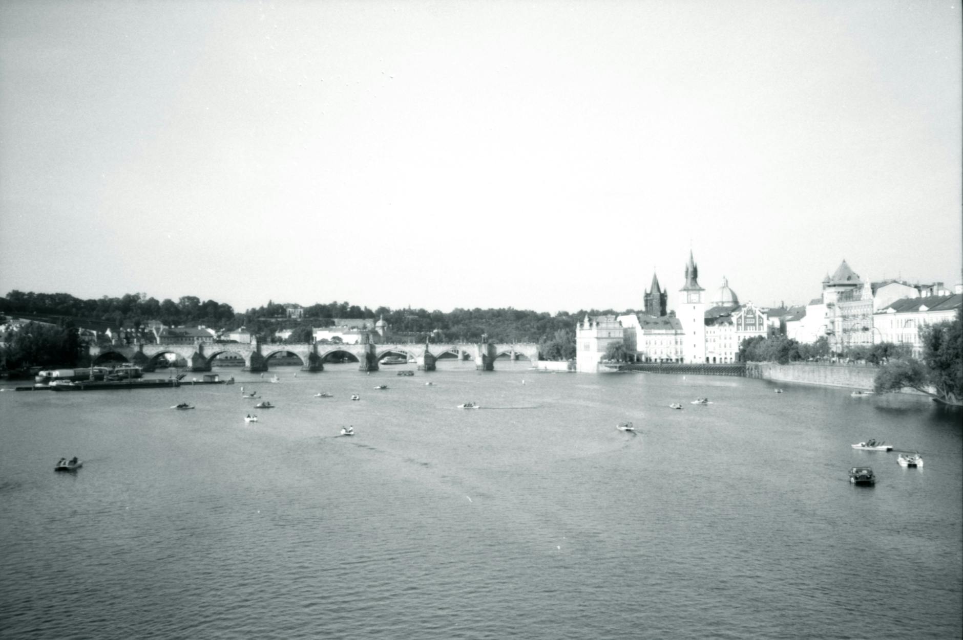 Black and white view of Charles Bridge in Prague over the Vltava River. Iconic Czech landmark. - Photo by Carlo Jünemann on Pexels