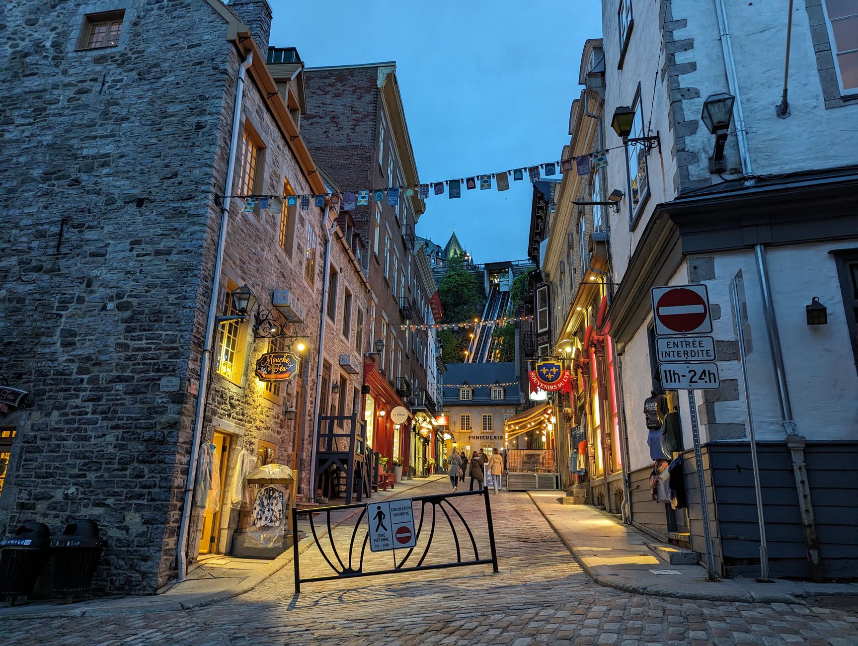 Rue du Petit-Champlain, where glassblowers, leatherworkers, and birchbark artists keep shop below the ramparts.