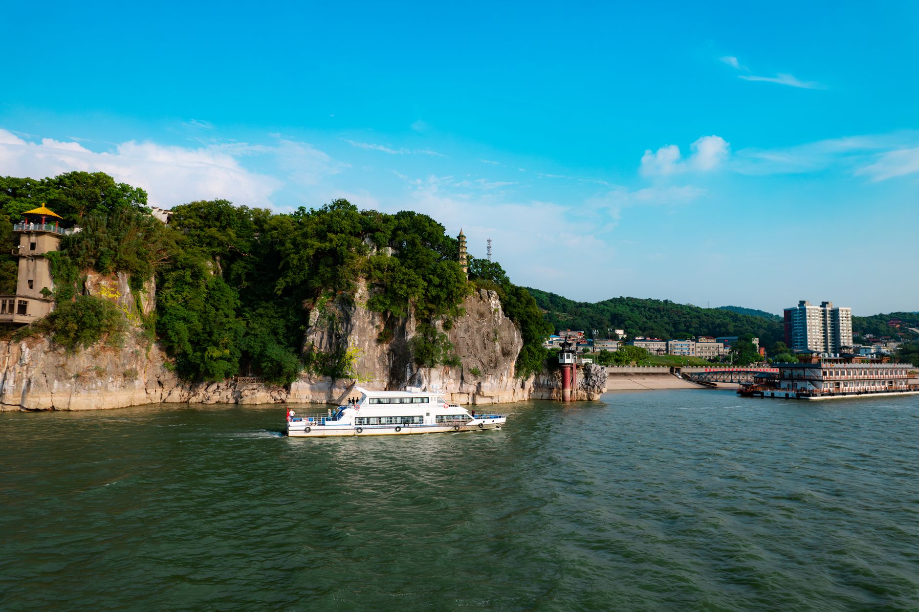 Shibaozhai's 1819 pagoda, now approached by pontoon and escalator since the water rose.
