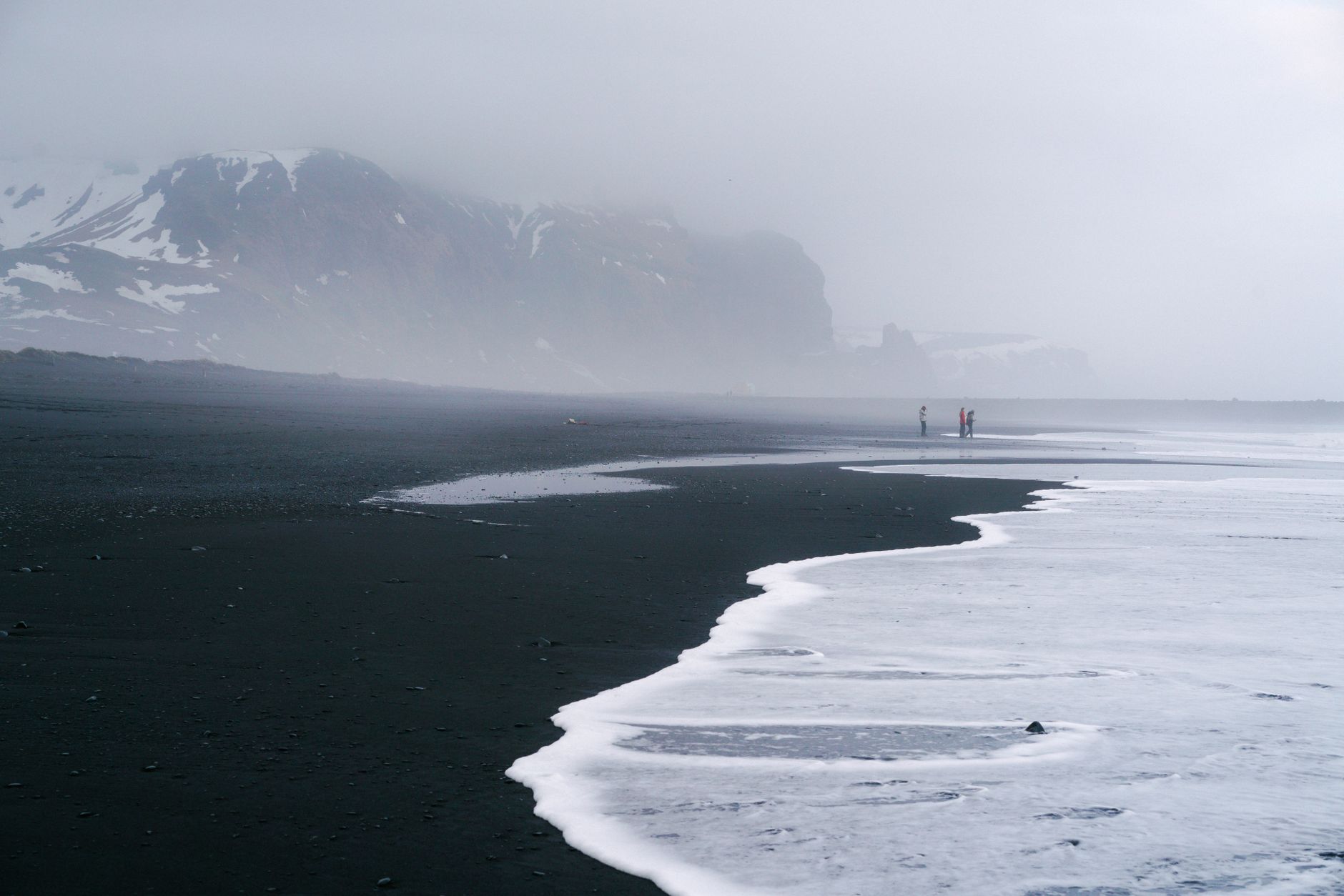 Steam rising off the geothermally warmed sand at Whalers Bay.