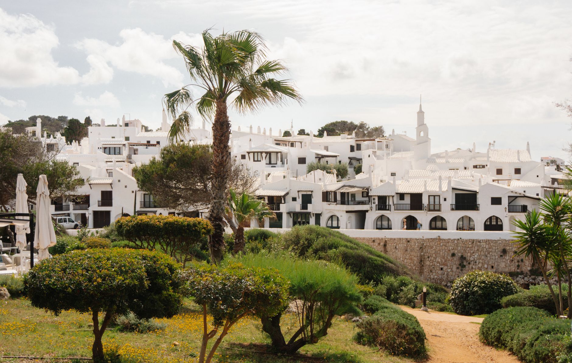 Stone villages like Ferrerias and Alayor sit quiet in spring, their narrow streets offering shade and a pace slower than the coasts.