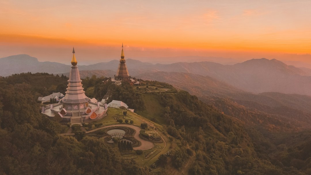 Thai temple silhouette during early morning golden light