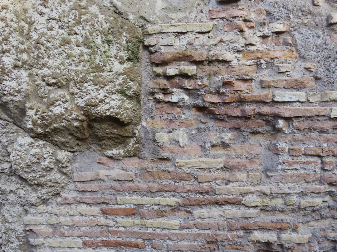 The Casa di Diana insula shows how ordinary Ostians lived, stacked in multi-storey brick apartment blocks.