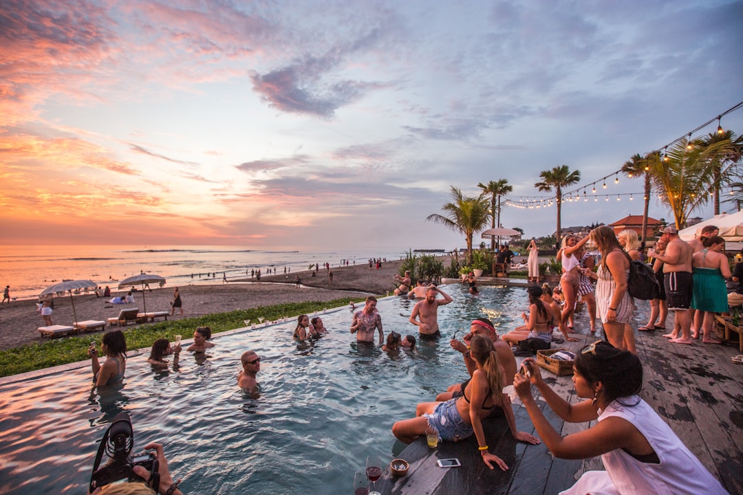 The clifftop pool at Karma Kandara in Ungasan, a popular reception setting after dark.