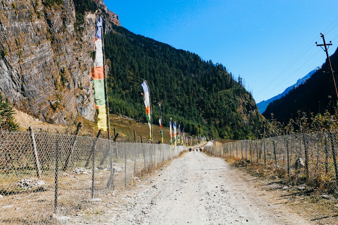 The curved granite face of Paungda Danda, between Chame and Pisang.