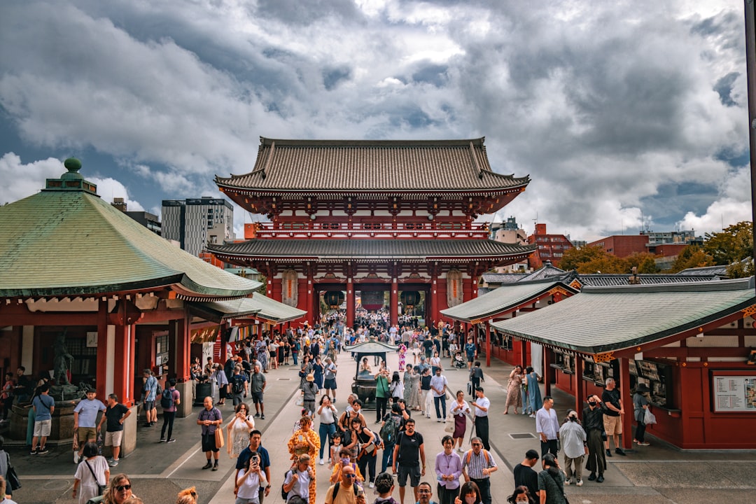 The Kaminarimon gate at Senso-ji in Asakusa, best photographed before the day-trip crowds arrive around mid-morning.