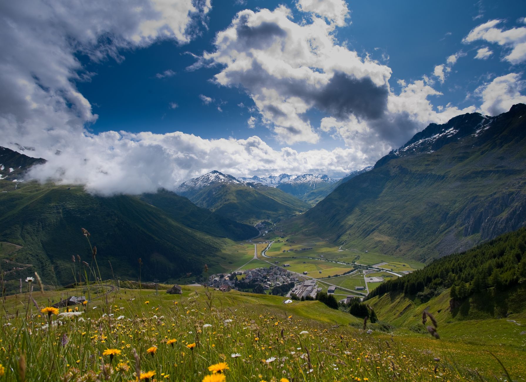 The meadows recover after summer grazing, and clearing weather brings unobstructed views to adjacent peaks.
