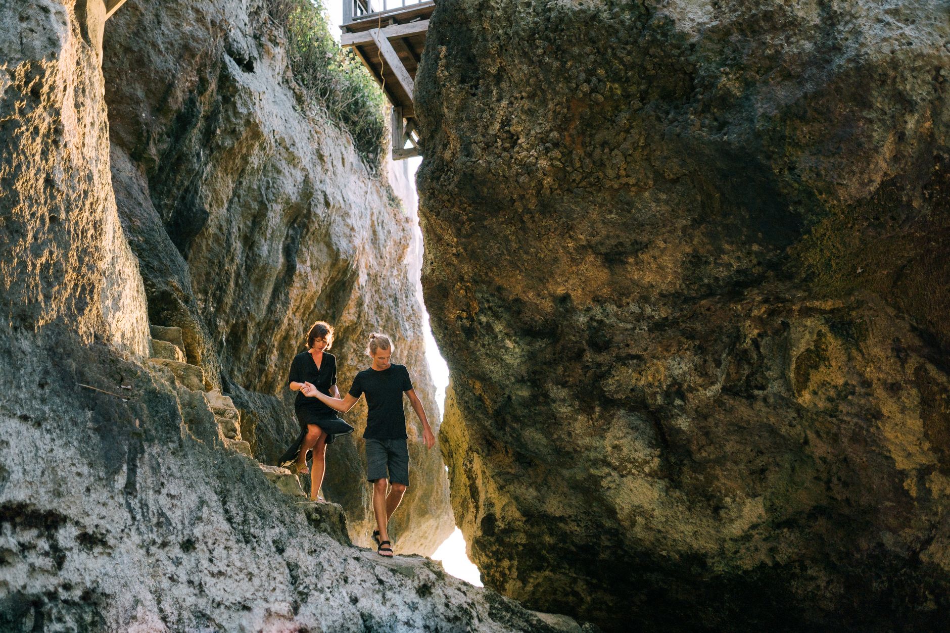 The narrow stone stairway down to Padang Padang Beach, a favorite half-day stop for wedding guests.