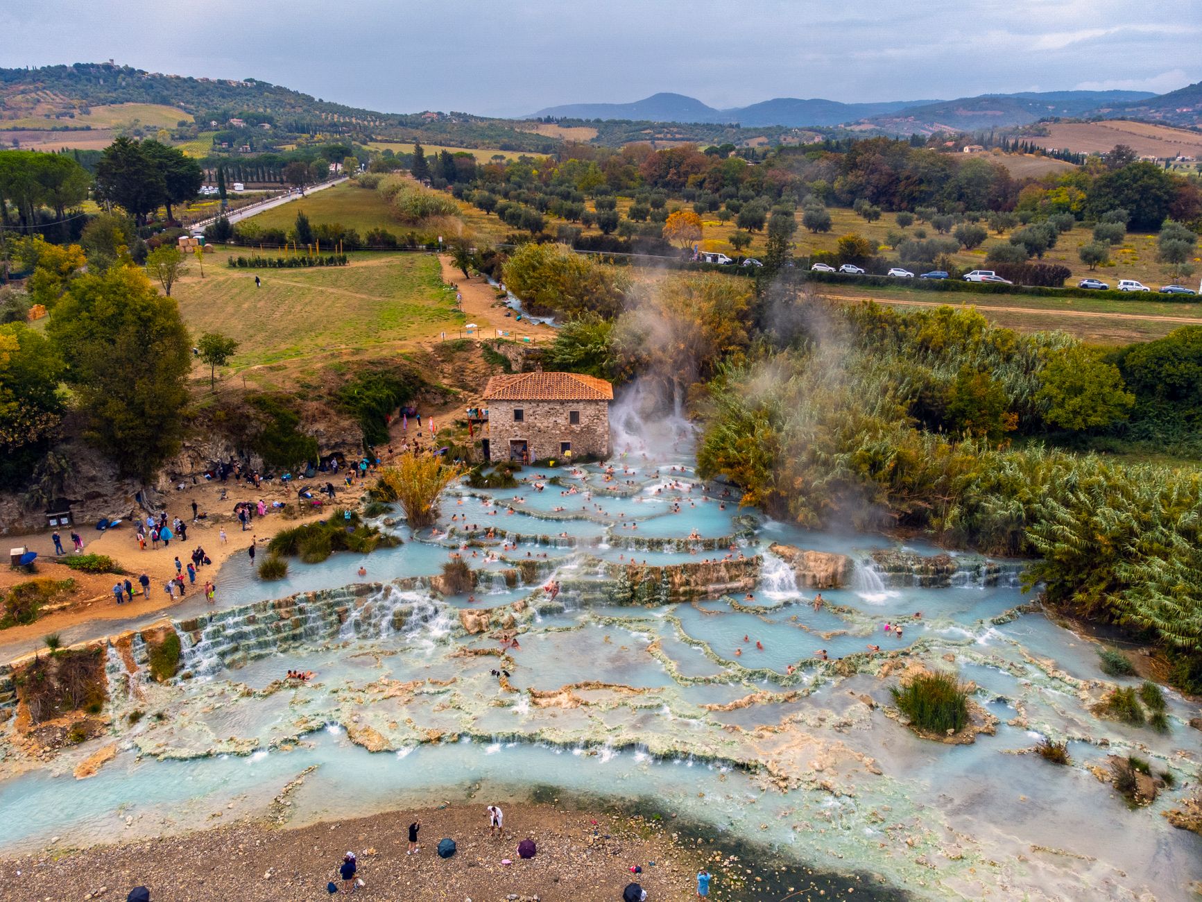 The old thermal basin at the center of Bagno Vignoni's piazza, a quiet detour for pre-wedding photographs.