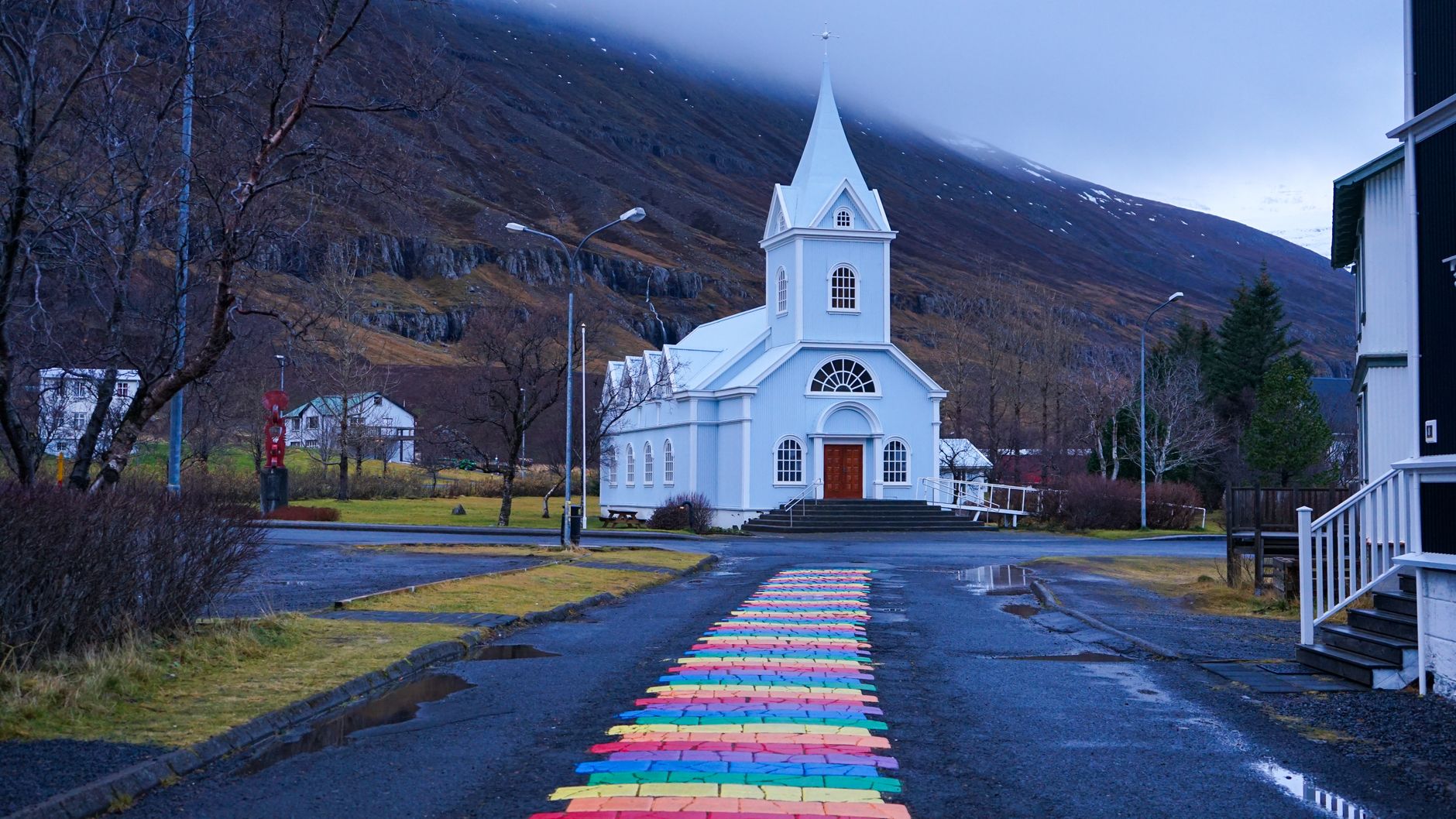 The painted street leading to the blue church in Seyðisfjörður, in Iceland's East Fjords.