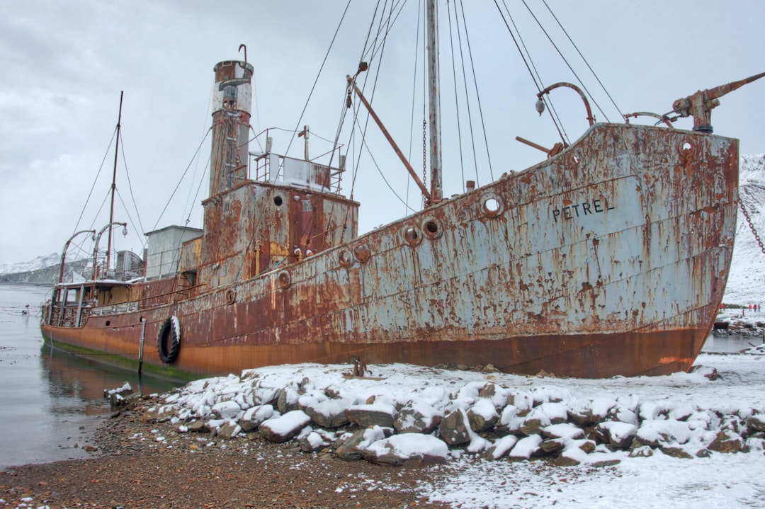 The rusted tanks of Grytviken's former whaling station, and Shackleton's grave in the small cemetery nearby.