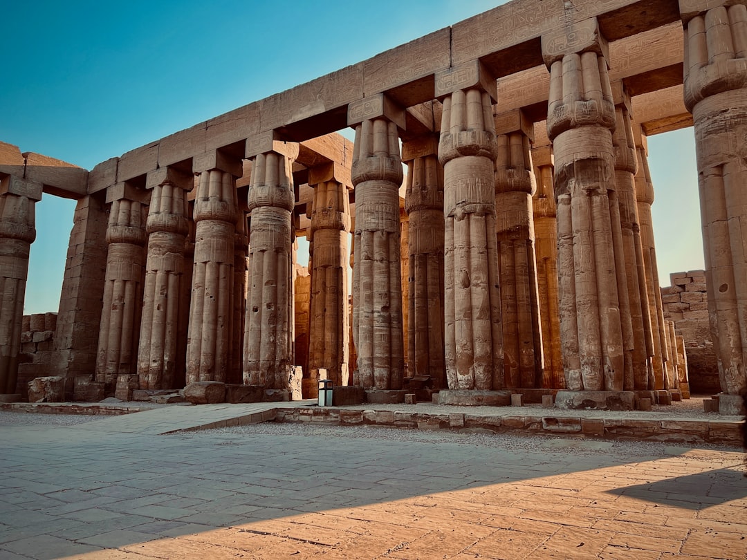 The Temple of Khnum at Esna sits well below modern street level, its hypostyle hall still being cleared of centuries of silt and mudbrick.