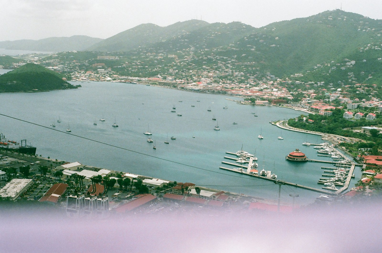 View of Charlotte Amalie harbor with cruise ships moored and colorful buildings along the waterfront