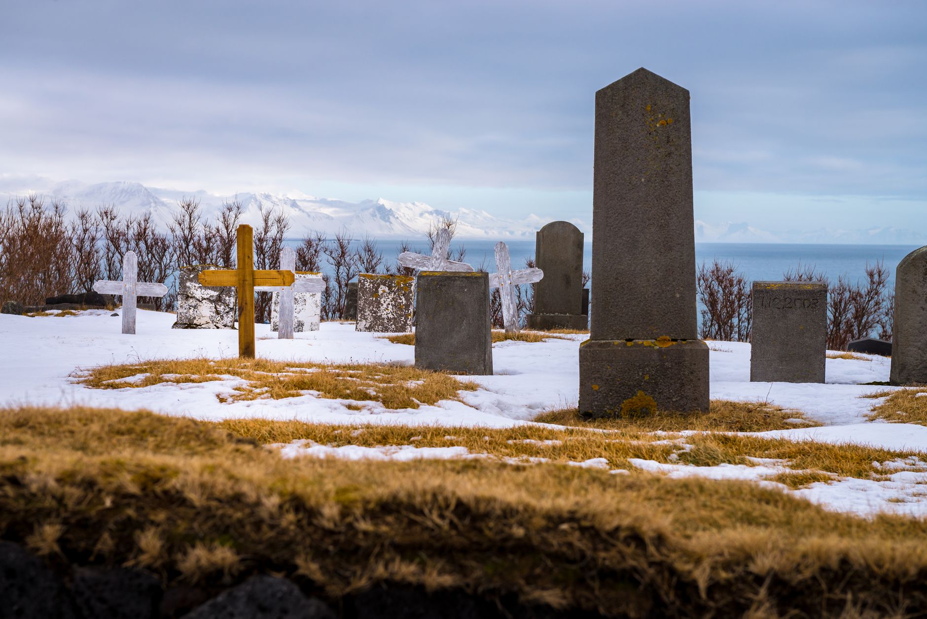Visitors traditionally pour a dram of whisky at Shackleton's granite headstone before drinking a toast to 'the Boss.'